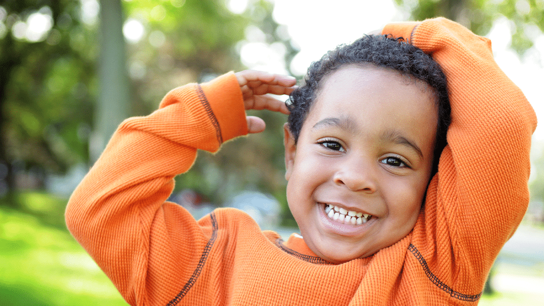 Little Boy In Orange